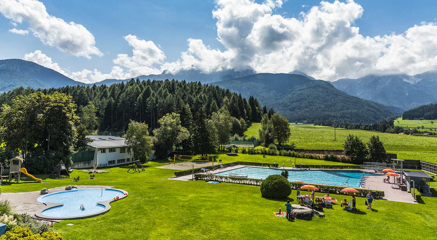 Outdoor swimming pool in Valdaora-Oland in summer