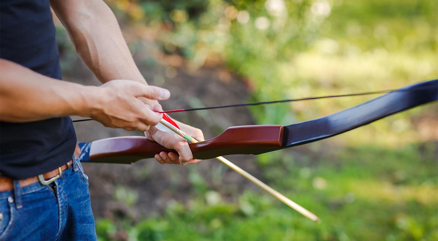 Archer preparing to shoot an arrow